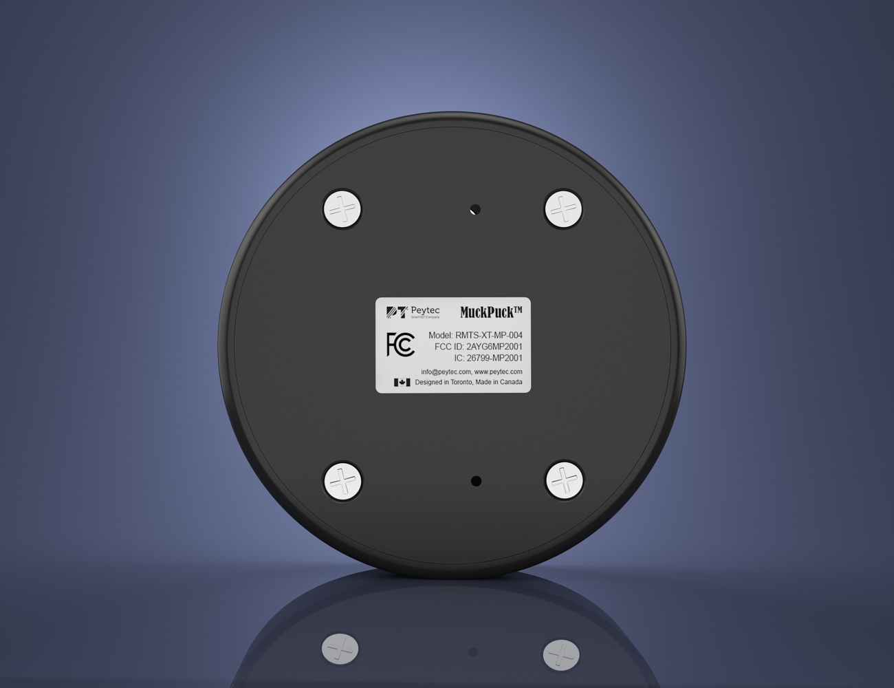 Rear of the MuckPuck Material Node showing its identification label and fasteners.